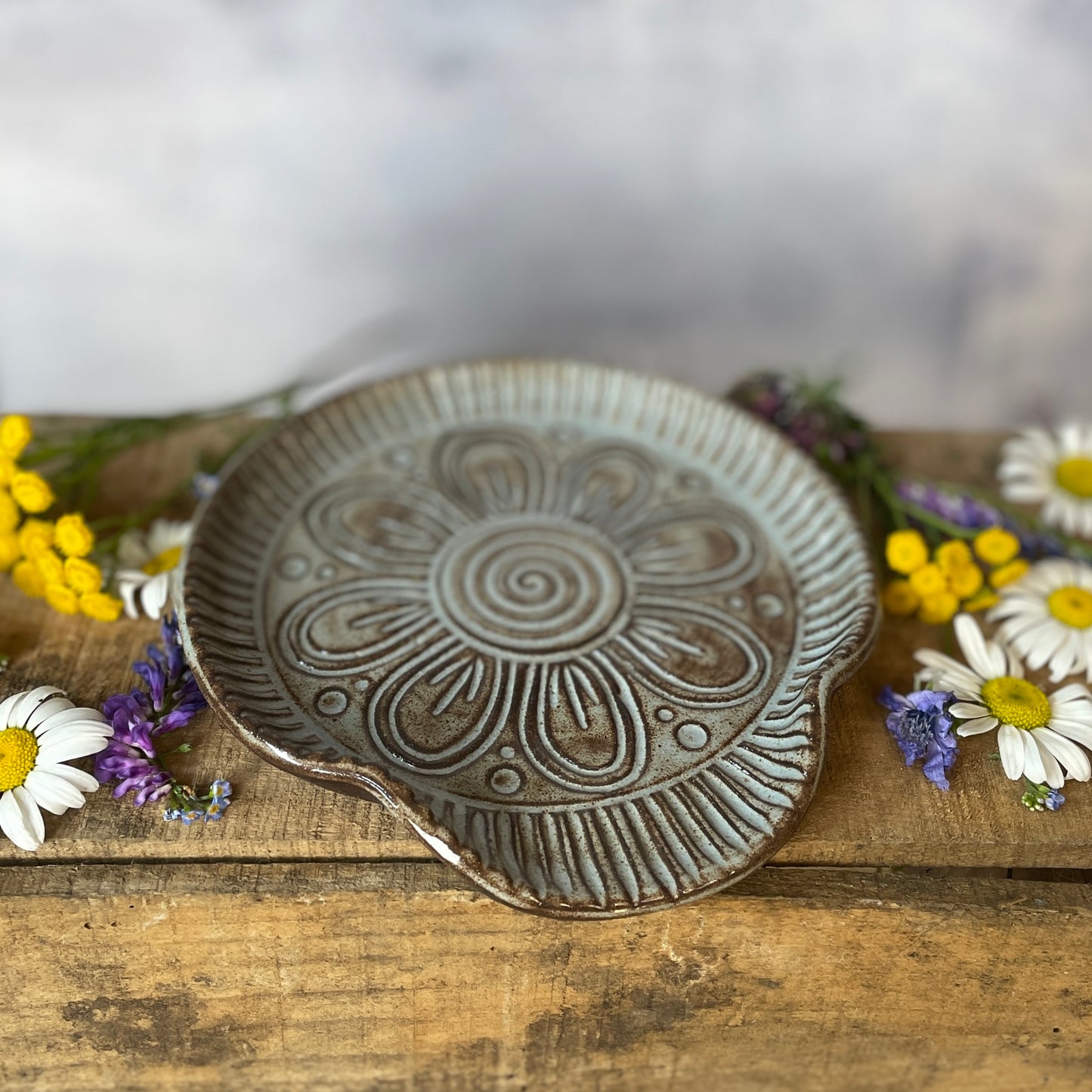 90. Hand Carved 6" Shino Flower Spoon Rest
