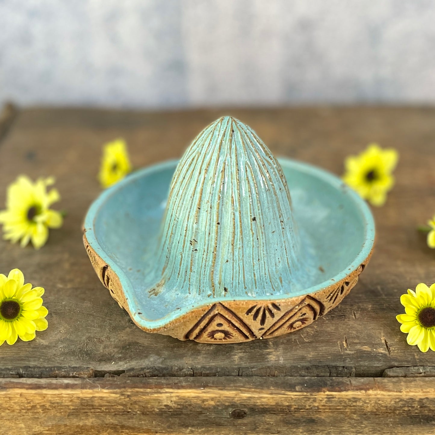 70. Hand Carved Lemon Juicer