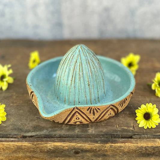 72. Hand Carved Lemon Juicer