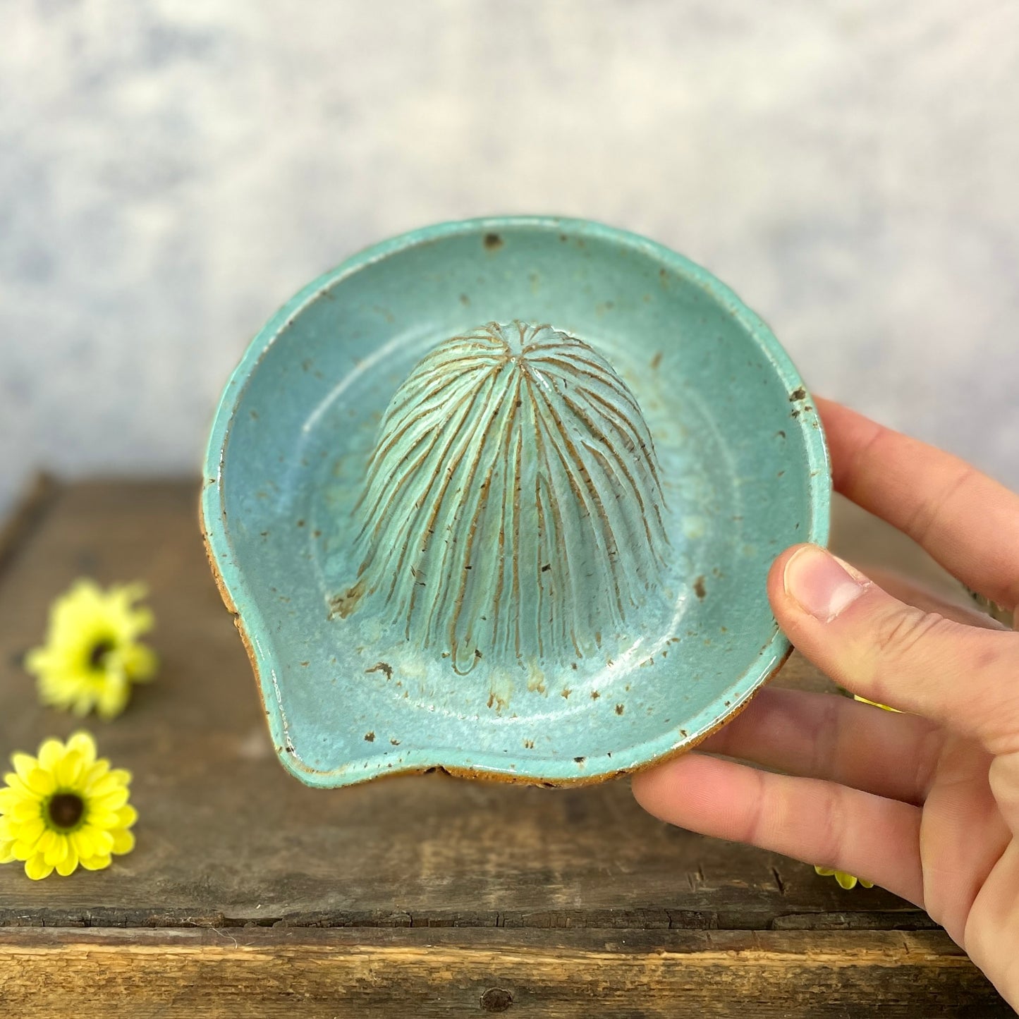 70. Hand Carved Lemon Juicer