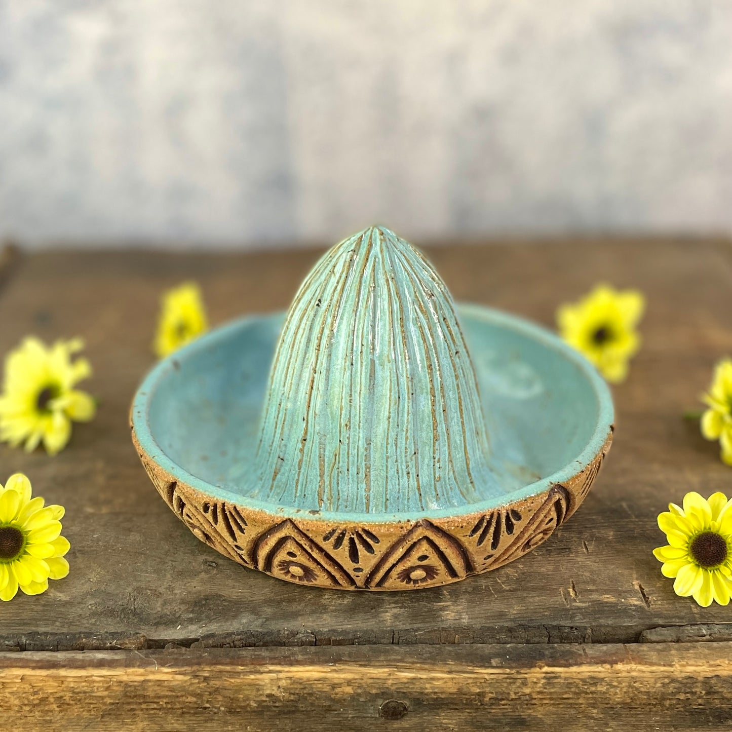 70. Hand Carved Lemon Juicer