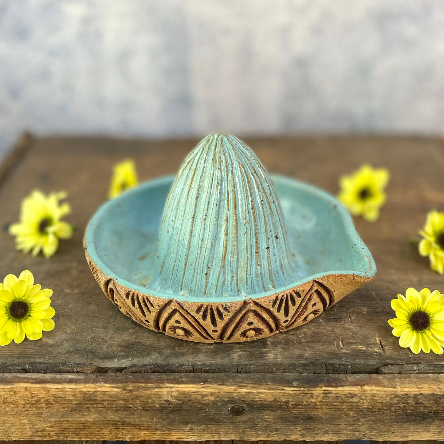 70. Hand Carved Lemon Juicer