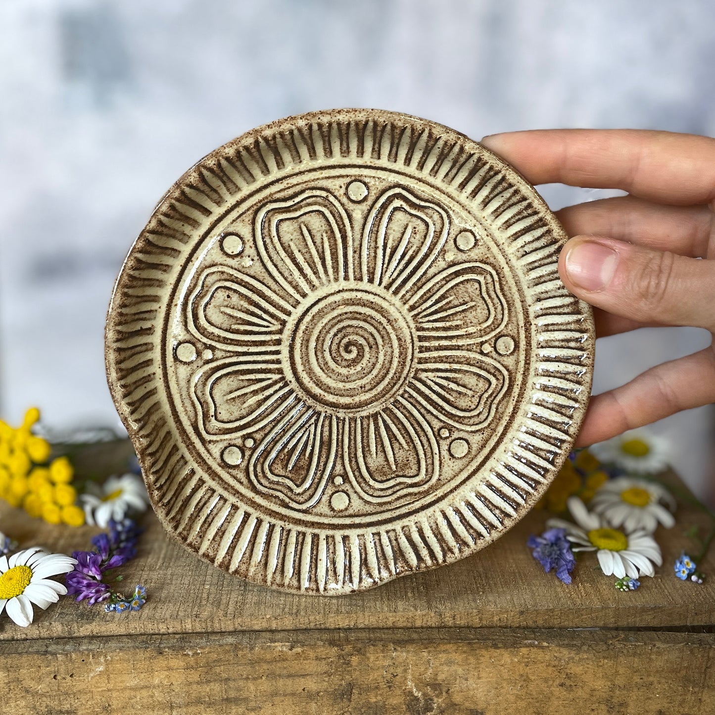91. Hand Carved 6" Shino Flower Spoon Rest