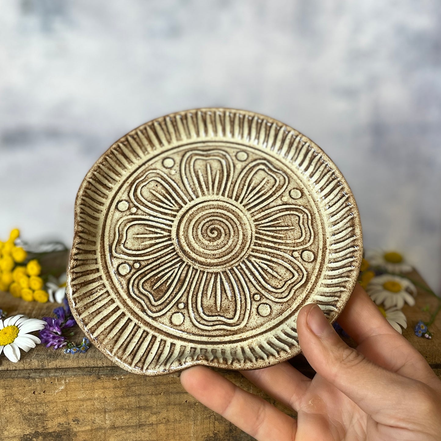 91. Hand Carved 6" Shino Flower Spoon Rest