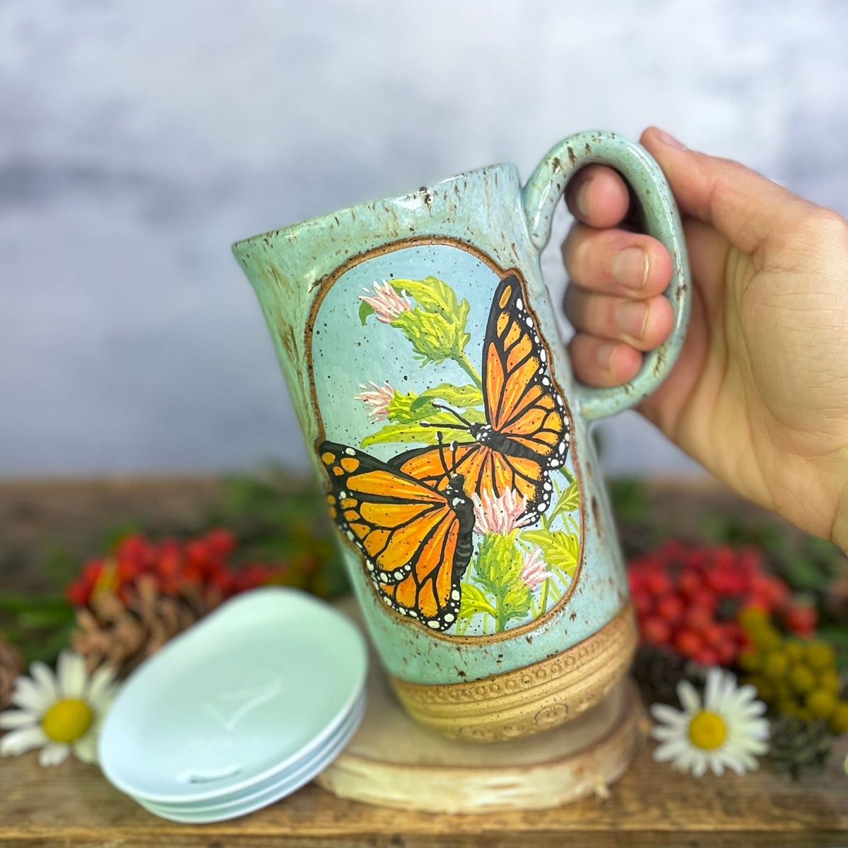 58. 18oz. Pair of Monarch Butterflies and thistle Travel Mug