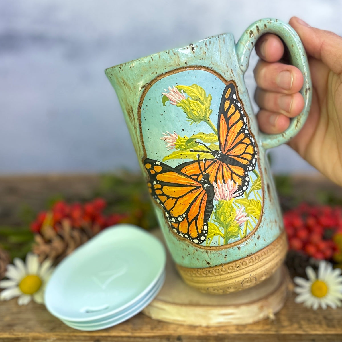 58. 18oz. Pair of Monarch Butterflies and thistle Travel Mug