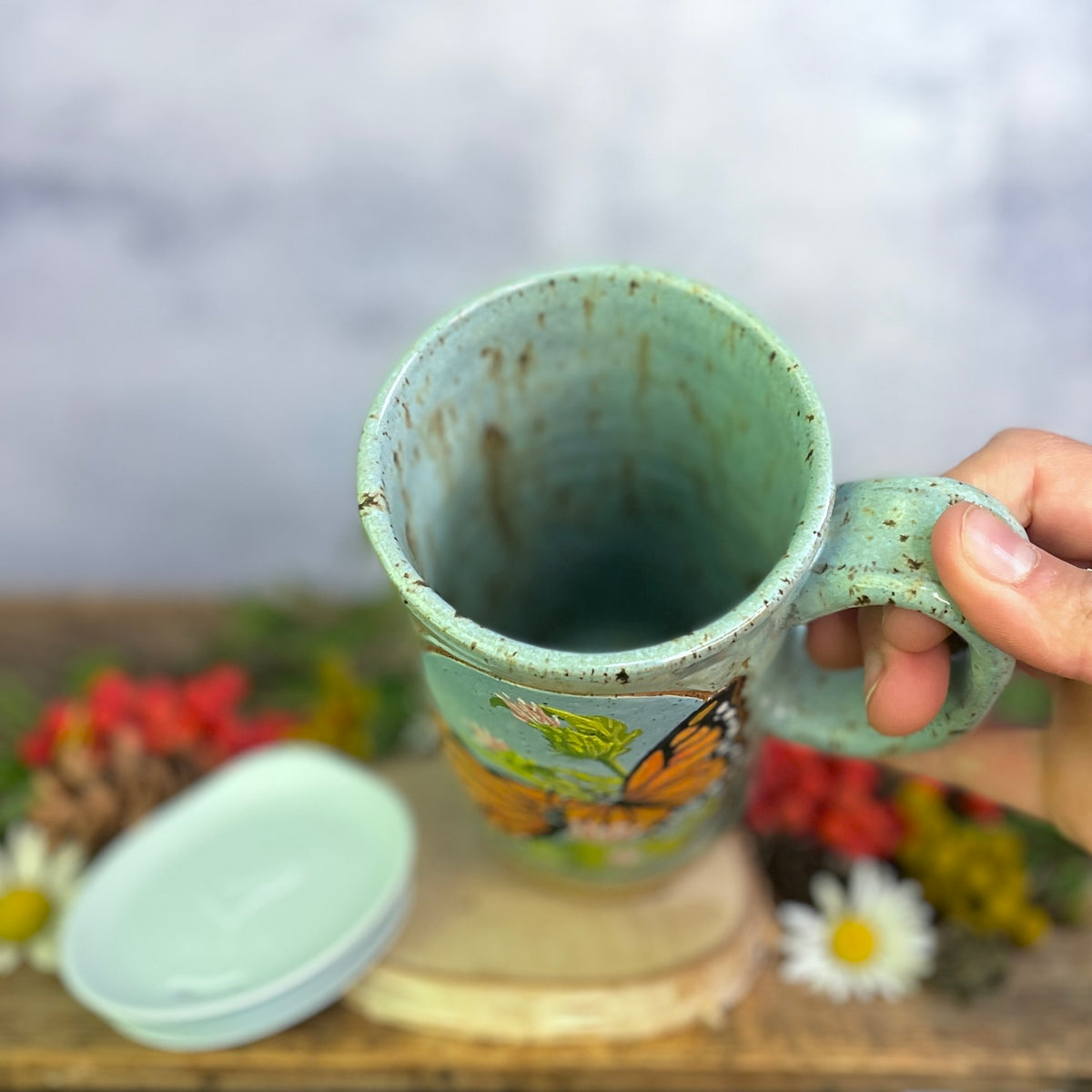 58. 18oz. Pair of Monarch Butterflies and thistle Travel Mug