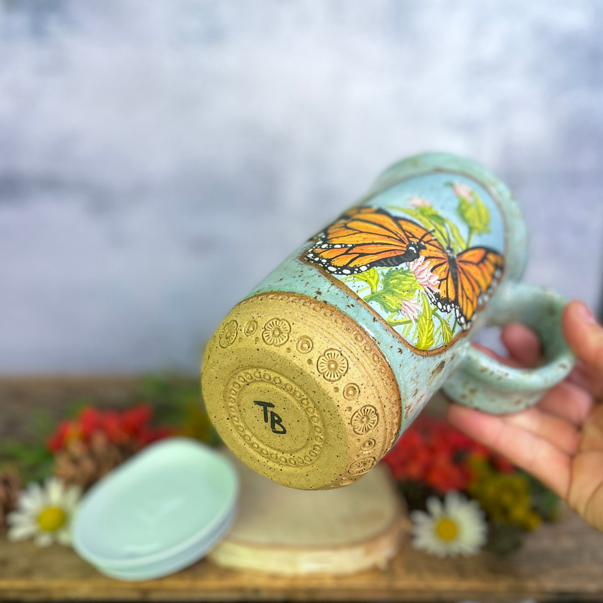 58. 18oz. Pair of Monarch Butterflies and thistle Travel Mug